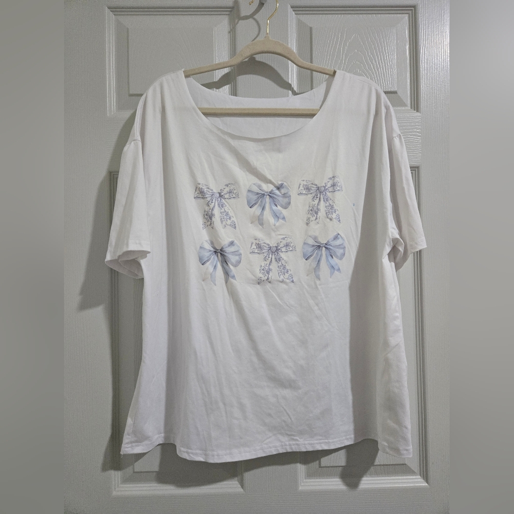 SHEIN White Top with Blue Bow Design